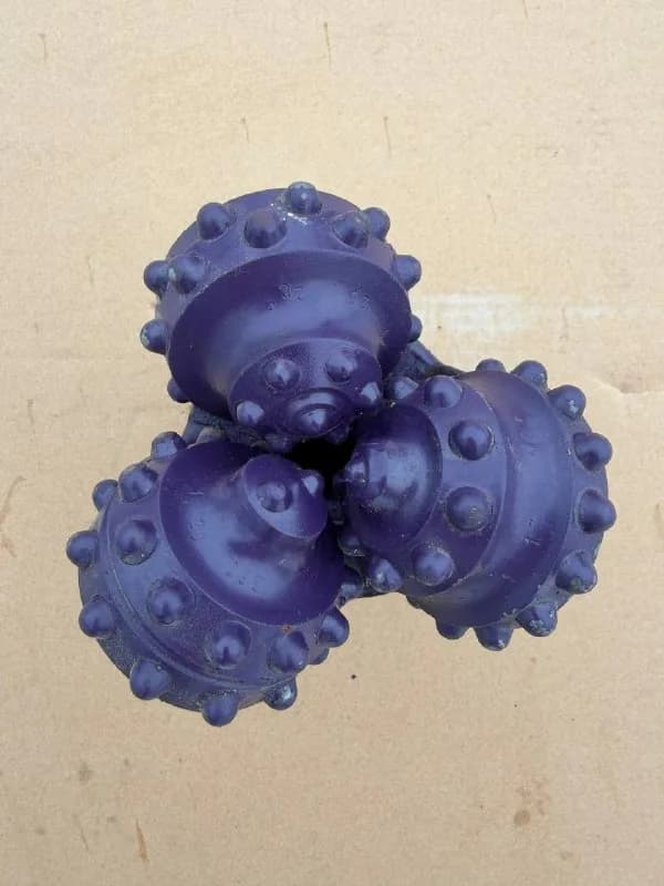 127 mm (5") Tricone Bit with Carbide Inserts (TCI), open bearing, IADC 622, 2 7/8 API Reg — UDT