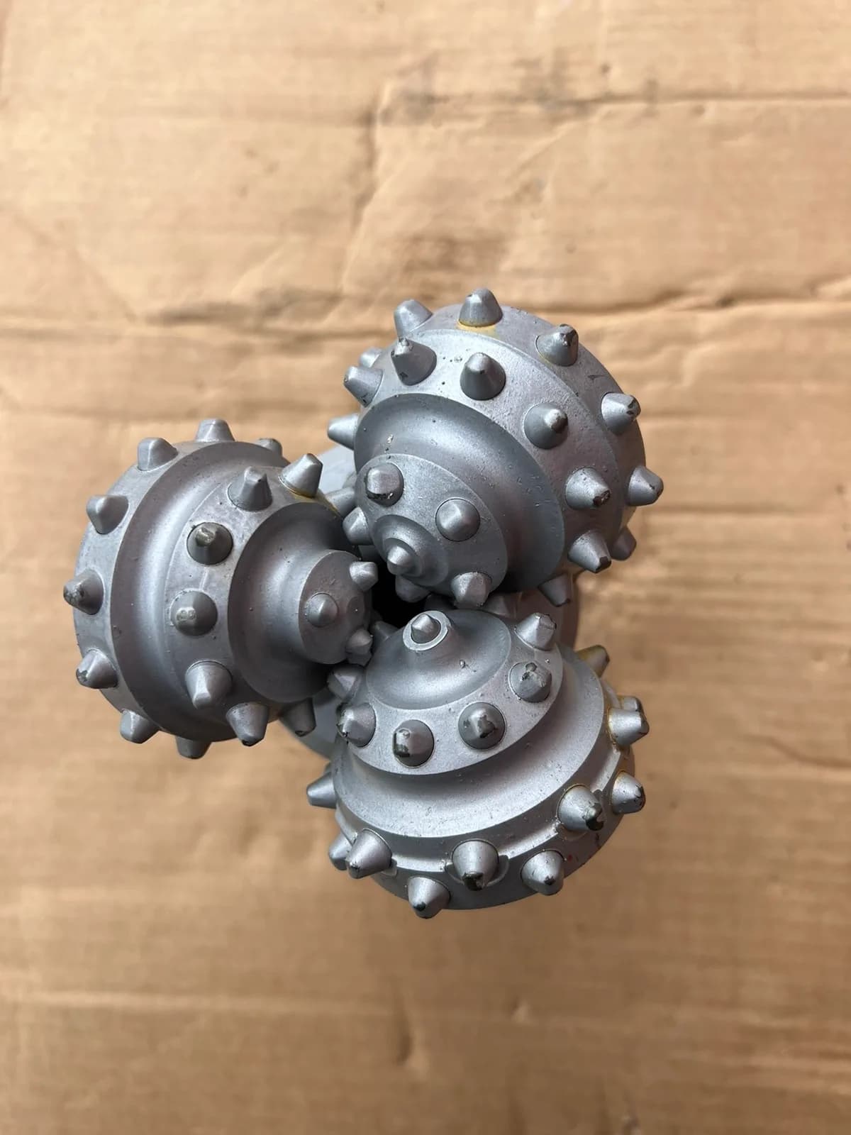 127 mm (5") Tricone Bit with Carbide Inserts (TCI), open bearing, IADC 523, 2 7/8 API Reg — NRB