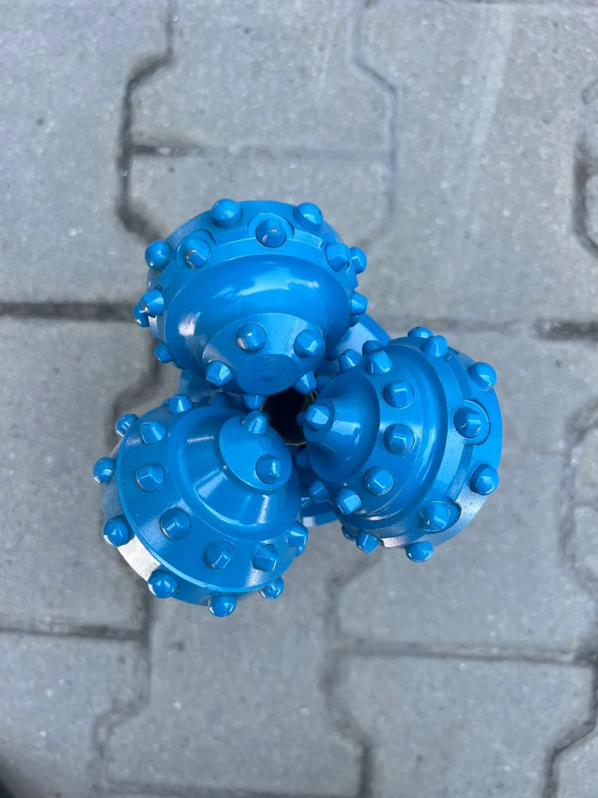 120.6 mm (4 3/4") Tricone Bit with Carbide Inserts (TCI), open bearing, IADC 513, 2 7/8 API Reg — NRB